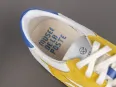 Vue 3 – chaussures jaunes